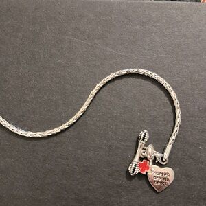 Silver Nurse bracelet with heart. “Nurses are all heart”